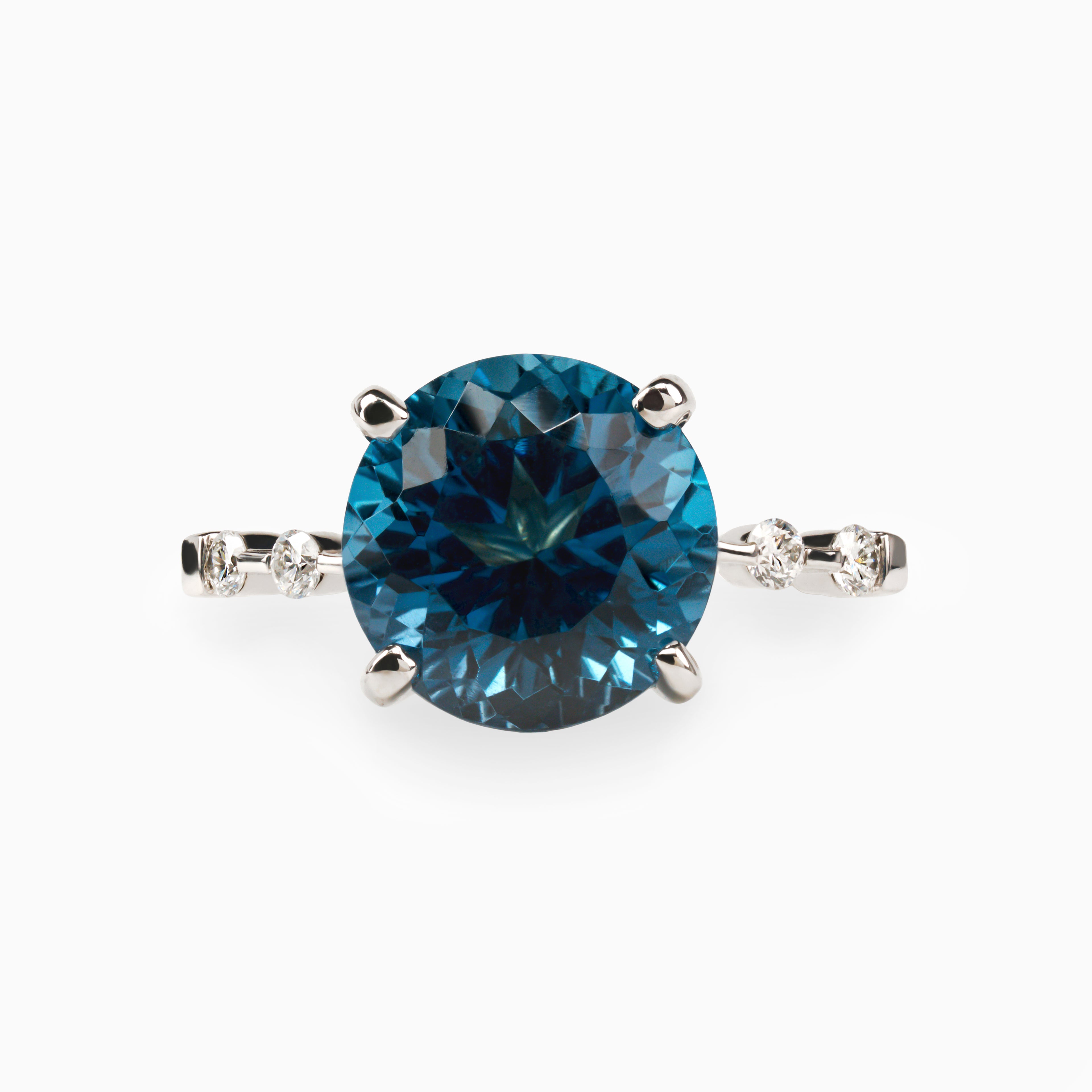 5.09ct. Blue Topaz Ring with Lab Side Diamonds