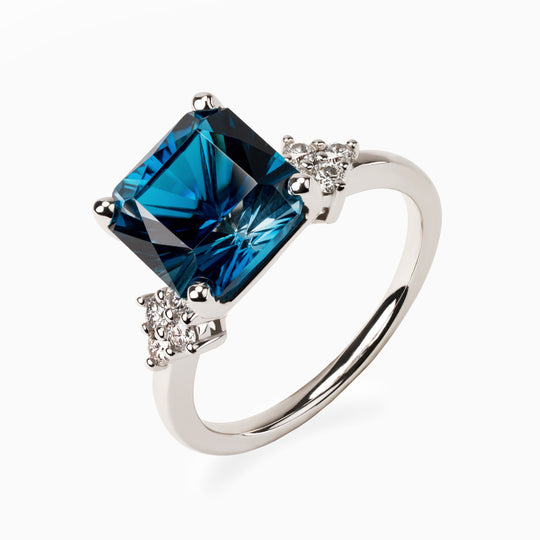 4.40ct Blue Topaz Ring with Lab Side Diamonds