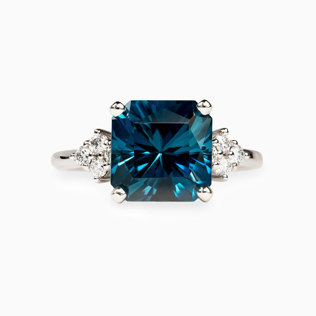 4.40ct Blue Topaz Ring with Lab Side Diamonds