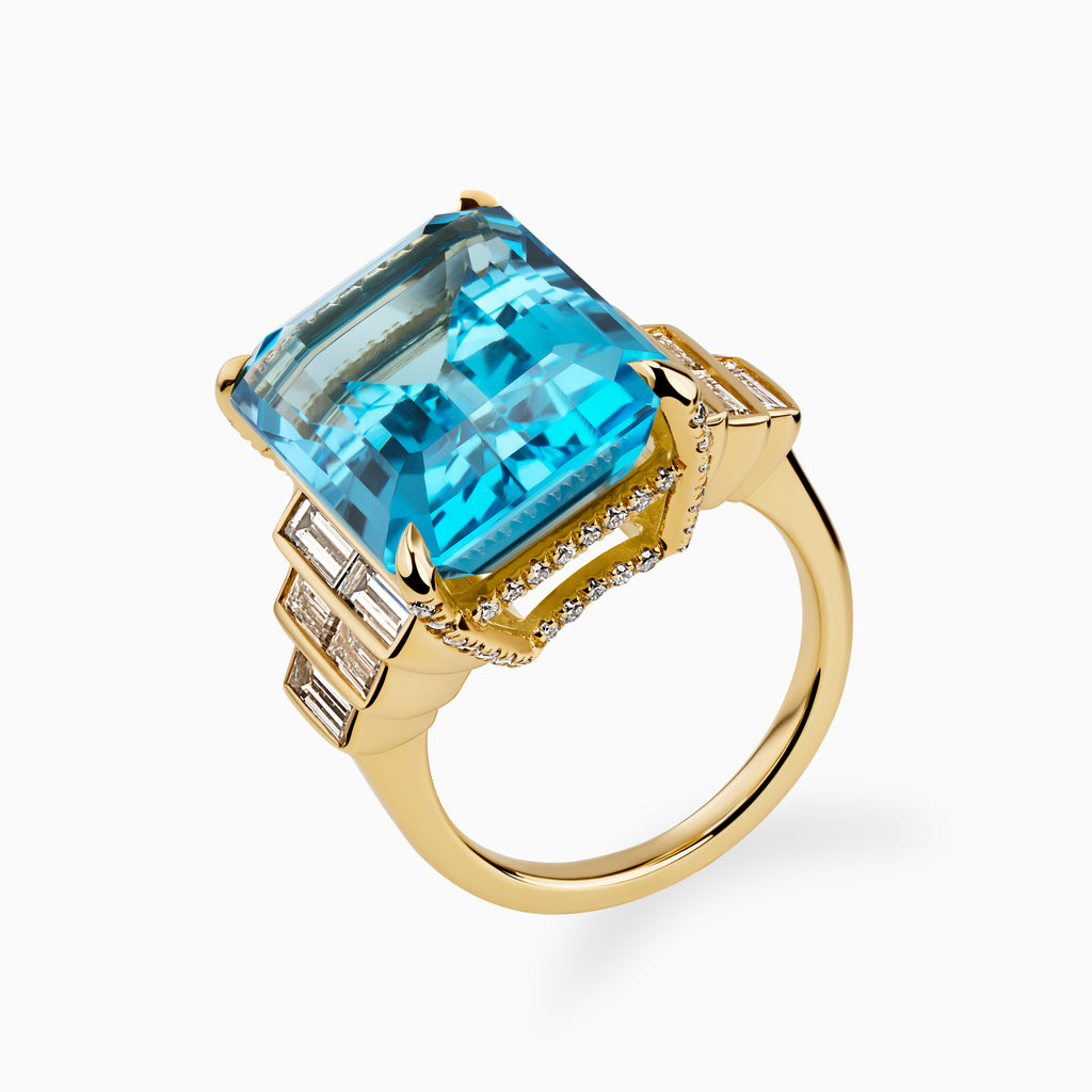 21.10ct Emerald Cut Blue Topaz Ring with Baguette Diamond Steps