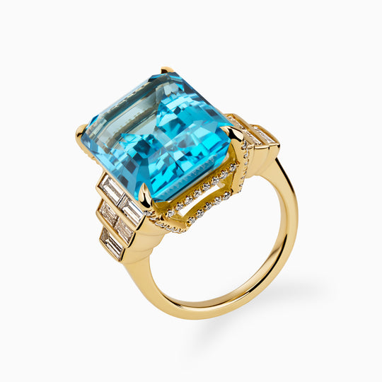 21.10ct Emerald Cut Blue Topaz Ring with Baguette Diamond Steps