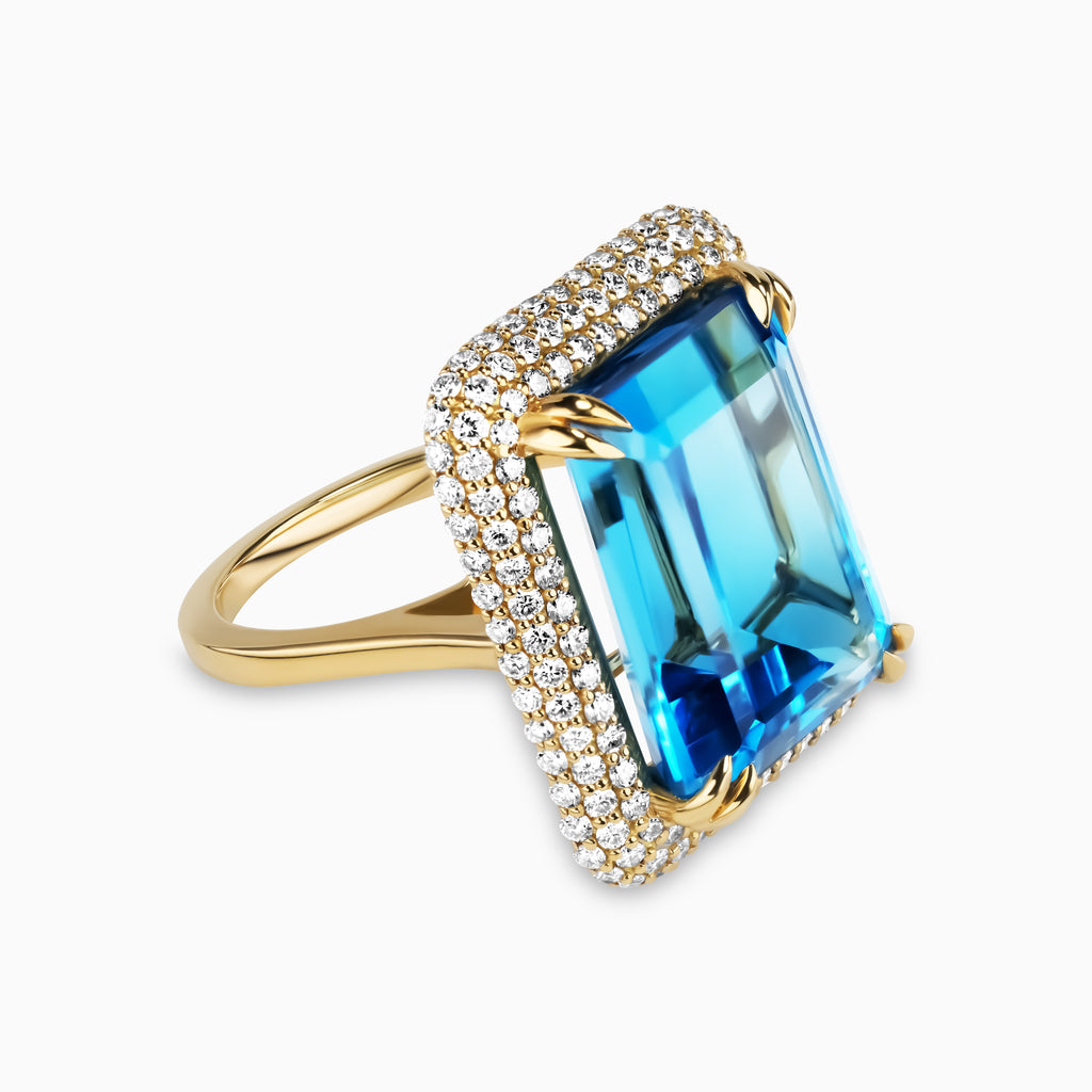 21.37ct Emerald Cut Blue Topaz Ring with Diamond Halo