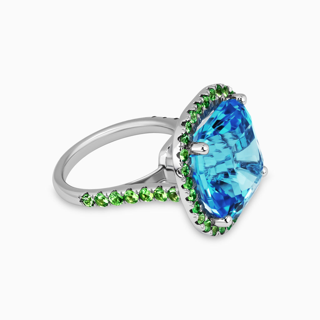 18.12ct Blue Topaz Ring with Tsavorite Halo and Accent Stones